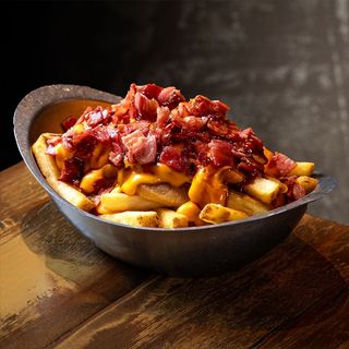 Patatas cheddar y bacon