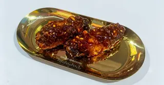 Alitas de pollo con salsa chilidulce coreana (2 uds.)
