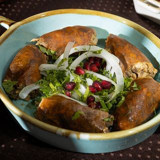 შებოლილი კუპატი კეცზე