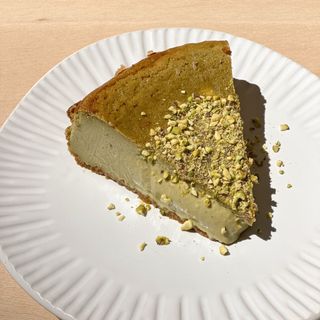 Tarta de Queso Pistacho porción