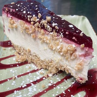 Cheesecake al cioccolato bianco e salsa ai Lamponi