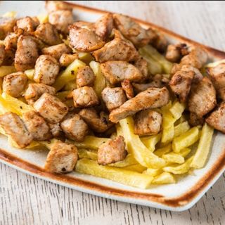 Raxo con patatas (ración)