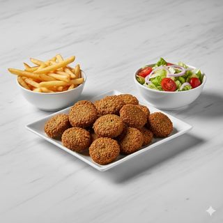 Plato De Falafel Con Patatas Y Ensalada