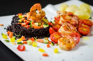 125. Risotto venere con gamberi