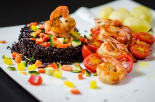 125. Risotto venere con gamberi