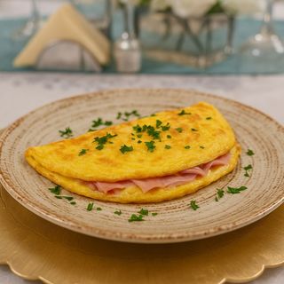 Omletă cu șuncă și cașcaval