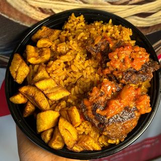 Jollof rice, Plantain and peppered beef 