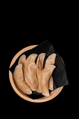 Дім сам варені зі свининою та куркою (200г)