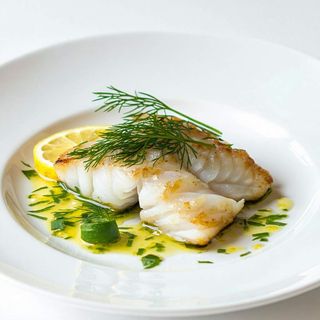 Filet z dorsza duszony w białym winie z trawą cytrynową 160g