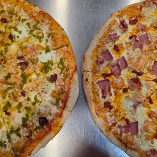 3 Porciones variadas (equivalente a 1 pizza mediana)