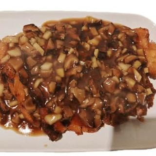 Pato con bambú y setas