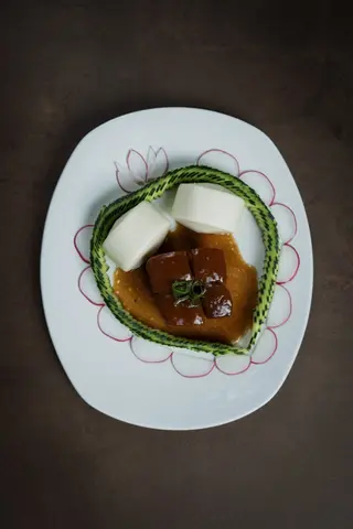 Pancetta di maiale brasata