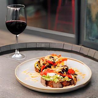 144. Паниран патладжан  със задушени домати (600гр)