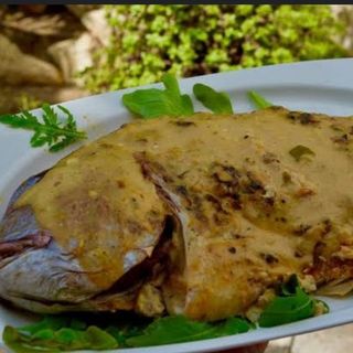 WHOLE FISH IN GARLIC SAUCE(Served with either ugali or chips)