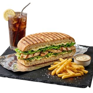 Menú campero + papas + bebida (330 ml.)