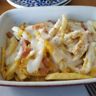 Ración De Patatas Gratinadas