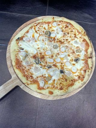 Pizza Fruits de Mer + boisson 