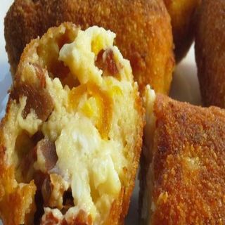  (1 unidad)Croqueton de chorizo y huevo frito  o (75 g)