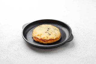 Шніцель рублений з курки під грибним соусом