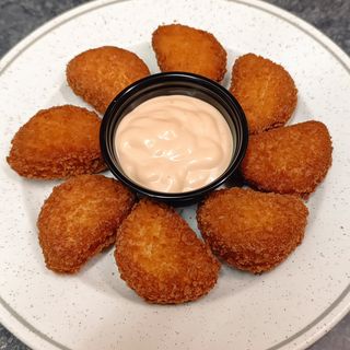 Nuggets de pechuga de pollo . 8 unidades 