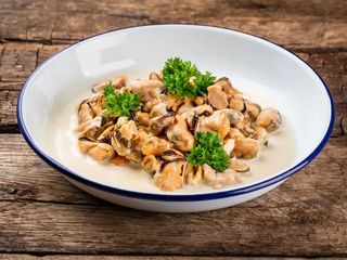 М'ясо мідій у вершковому соусі (200g)