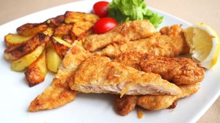 Хек пане със запечени картофи 350 гр.