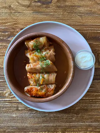 Cabbage rolls with meat and sour cream