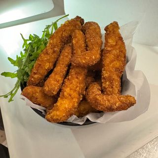 Stracetti croccanti di Pollo con fondutq di Formaggi