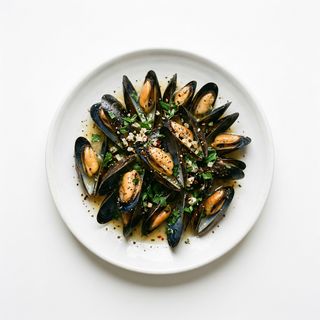 Salteado De Mejillones A La Pimienta