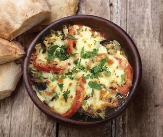 Баклажани запечені з помідорами та сиром у кеці (200г)