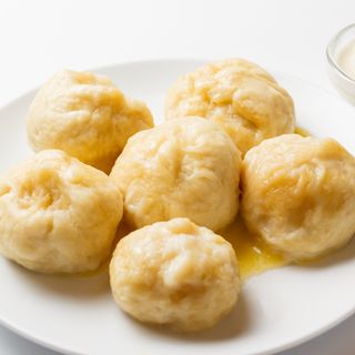 Фаршировані галушки з куркою та сметаною (250/50г)