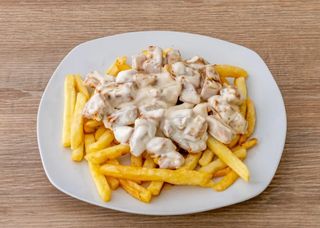 Ración De Raxo A La Crema Con Patatas