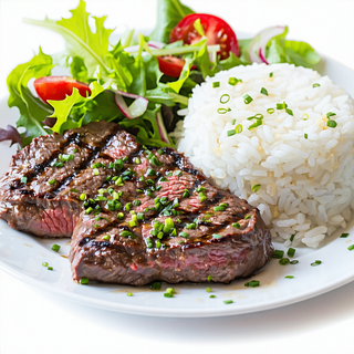 Carne De Ternera Ala Plancha Con Arroz Y Ensalada