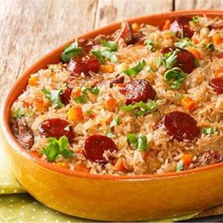 Arroz de pato + agua com gas 