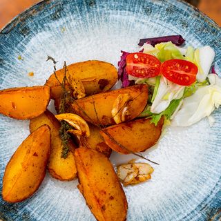 Cartofi copți cu unt