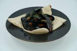 Scoici în sos de vin