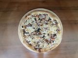 Пицца Проскутто мясная