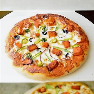 Paneer Tikka Pizza Large.