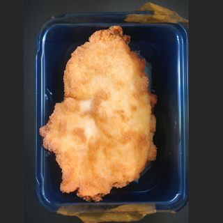 Snitel de pui in fulgi de porumb