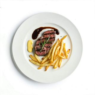 Lomo Porkschitzel + Patatas + Salsa Barnesa