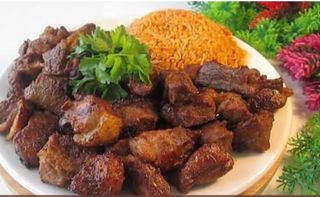 Dry fried pork chops with yellow rice 