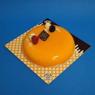 Torta con mango e cioccolato bianco