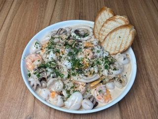 Мікс морепродуктів у вершковому соусі (870/40g)