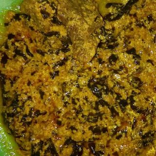 Tilapia fish mixed with egusi