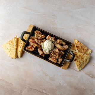 Svinjska rebarca na kajmaku