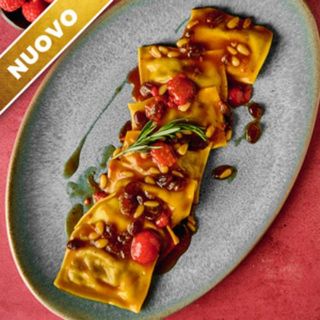 Rettangoli De Cochinillo En Salsa De Carne E Higo Con Frambuesas