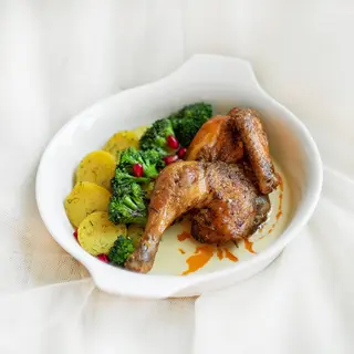 chicken shkmeruli with potatoes and broccoli