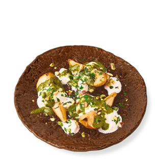 Pera assada com Stracciatella e Pesto de Pistácio