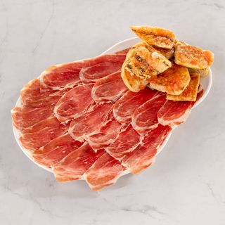 Jamon Iberico de bellota  (60 gr)con pan con Tomate 