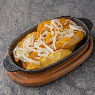 კარაქში შემწვარი კარტოფილი ხახვით (300 გრ.)